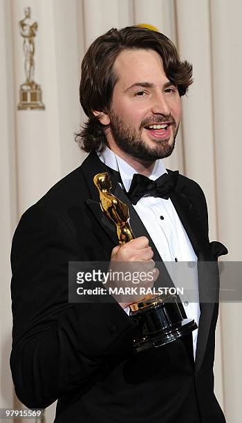 Mark Boal, winner of the best Original Screenplay for The Hurt Locker, poses with the Oscart at the 82nd Academy Awards at the Kodak Theater in...