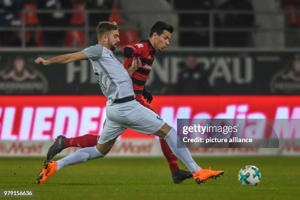 March 2018, Germany, Ingolstadt, Soccer, Second Bundesliga, FC Ingolstadt 04 vs. VfL Bochum at Audi sports park: Bochum's Lukas Hinterseer and...