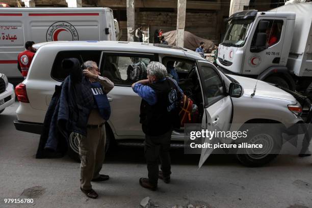 Members prepare to deliver aid to the people of the rebel-held city of Douma, in Eastern Ghouta province, Syria, 05 March 2018. A 46-truck convoy...