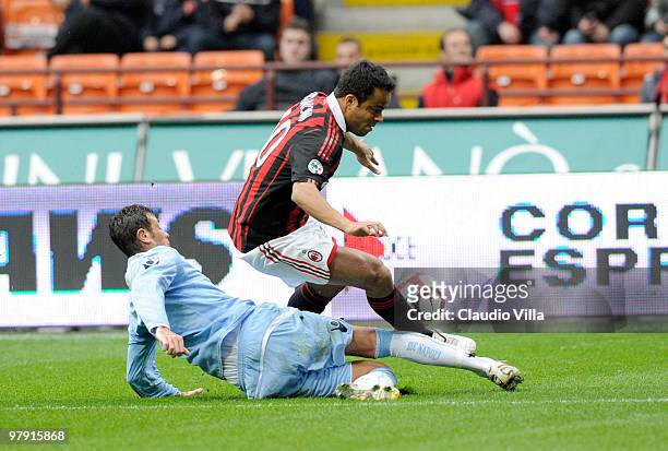 Amantino Mancini of AC Milan competes for the ball with Paolo Cannavaro of SSC Napoli during the Serie A match between AC Milan and SSC Napoli at...