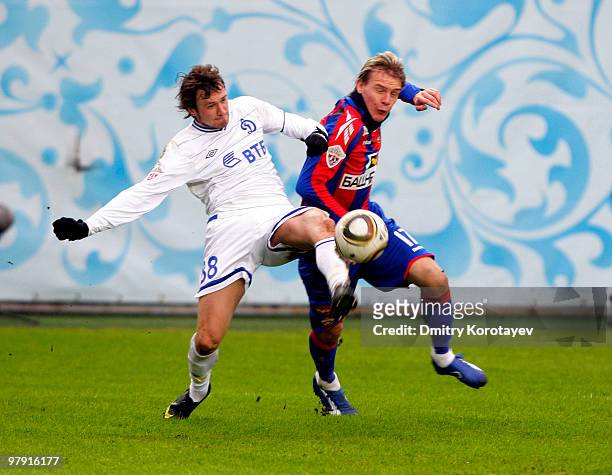 Milos Krasic of PFC CSKA Moscow battles for the ball with Edgaras Cesnauskis of FC Dynamo Moscow during the Russian Football League Championship...