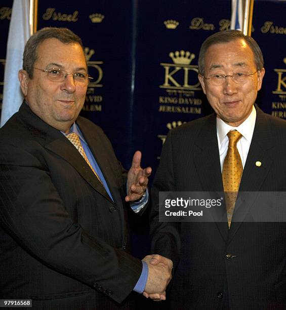 Secretary General Ban Ki-moon shakes hands with Israeli Defence Minister Ehud Barak during a meeting on March 21, 2010 in Jerusalem, Israel. Ban...
