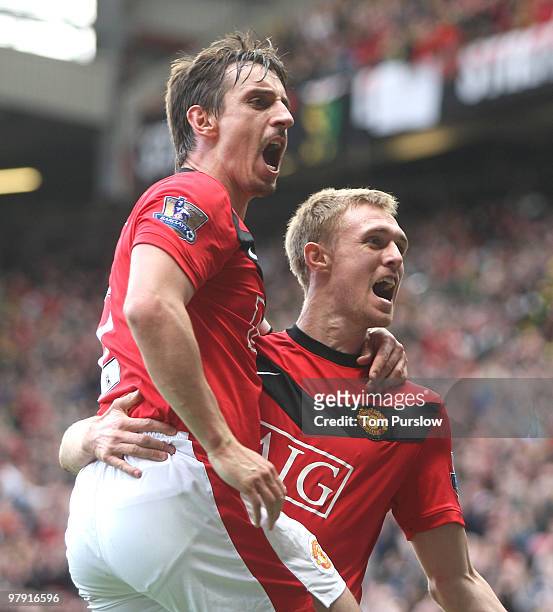 Gary Neville and Darren Fletcher of Manchester United celebrate their part in Ji-Sung Park scoring their second goal during the FA Barclays Premier...