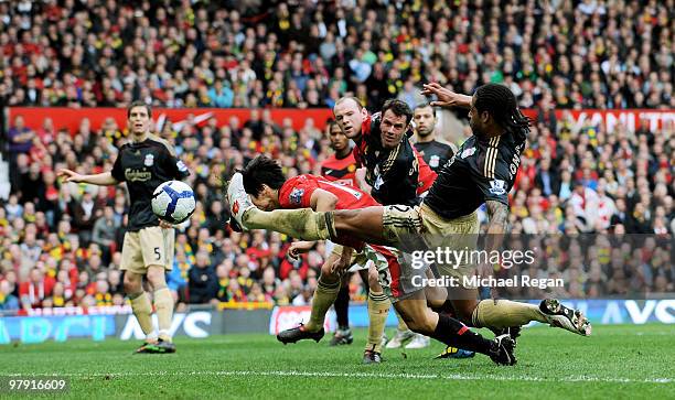 Ji-Sung Park of Manchester United heads in his team's second goal during the Barclays Premier League match between Manchester United and Liverpool at...