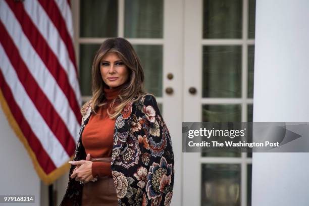 First lady Melania Trump listens as President Donald Trump speaks during the National Thanksgiving Turkey Pardoning Ceremony in the Rose Garden at...