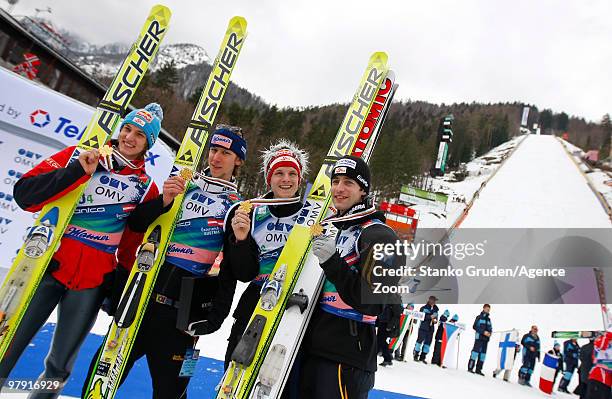 The Austrian team takes the gold medal during the FIS Ski Flying World Championships, Day 3 Team HS215 on March 21, 2010 in Planica, Slovenia.