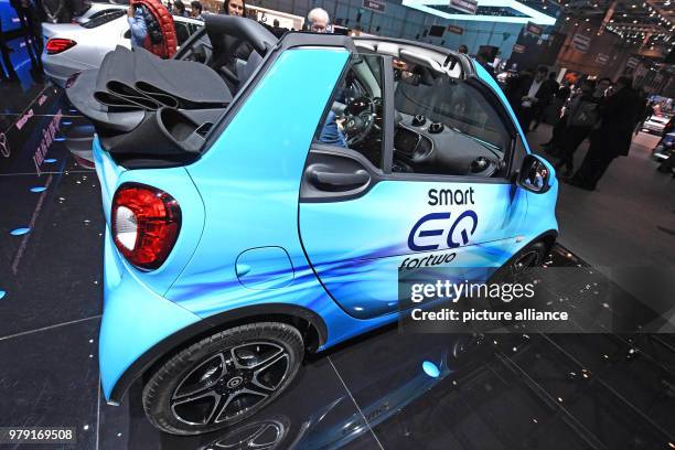 March 2018, Switzerland, Geneva: The electric Smart EQ fortwo Cabrio being presented during the first press day of the Geneva Motor Show. The 88th...