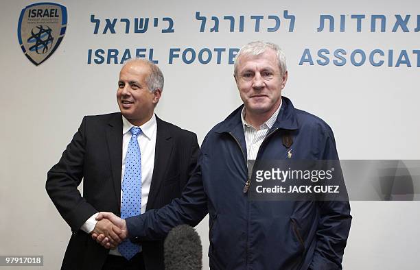 Luis Fernandez , former head coach of Paris St Germain and Betar Jerusalem, shakes hands with Avi Luzon, chairman of the Israel Football Association,...