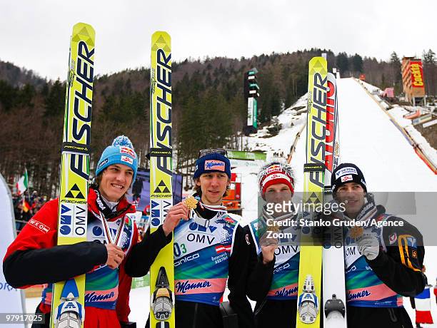 The Austrian team takes the gold medal during the FIS Ski Flying World Championships, Day 3 Team HS215 on March 21, 2010 in Planica, Slovenia.