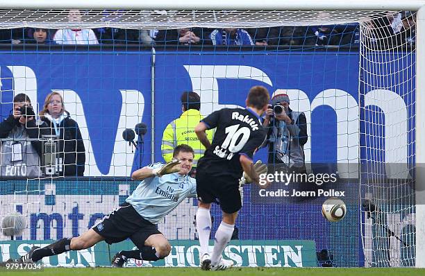Ivan Rakitic of Schalke scores his team's second goal via penalty against goalkeeper Frank Rost of Hamburg during the Bundesliga match between...