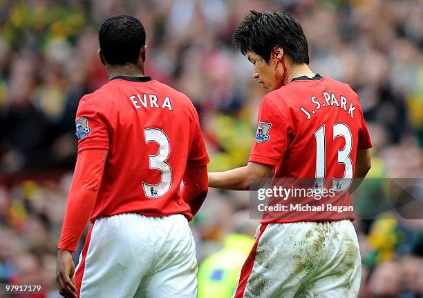 Ji-Sung Park of Manchester United bleeds from a cut to his head after scoring the winning goal during the Barclays Premier League match between...