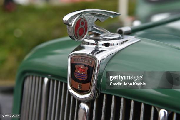 View of a Morris 8 car bonnet chrome badge emblem on display during the Southend Classic Car Show along the seafront on June 17, 2018 in Southend on...