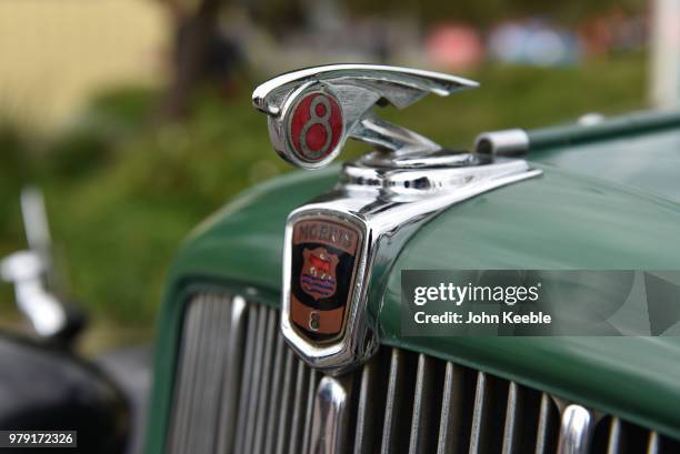 View of a Morris 8 car bonnet chrome badge emblem on display during the Southend Classic Car Show along the seafront on June 17, 2018 in Southend on...