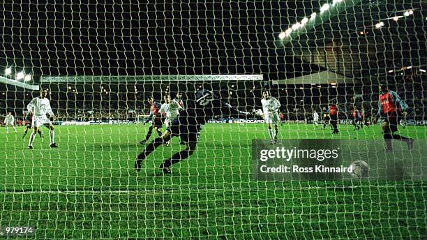 Alan Smith of Leeds beats Francisco Molina of Deportivo to score during the match between Leeds United and Deportivo La Coruna in the UEFA Champions...