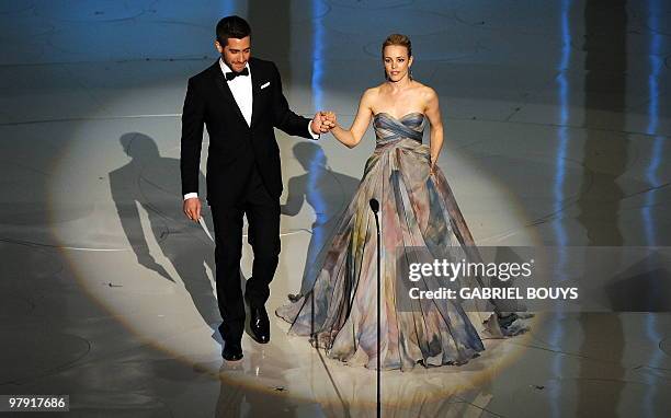 Actor Jake Gyllenhaal and Rachel Mcadams arrive onstage to present the award for Best Adapted Screenplay at the 82nd Academy Awards at the Kodak...