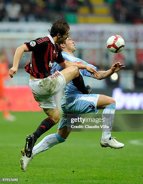 Mathieu Flamini of AC Milan clashes with with Ezequiel Lavezzi of SSC Napoli during the Serie A match between AC Milan and SSC Napoli at Stadio...