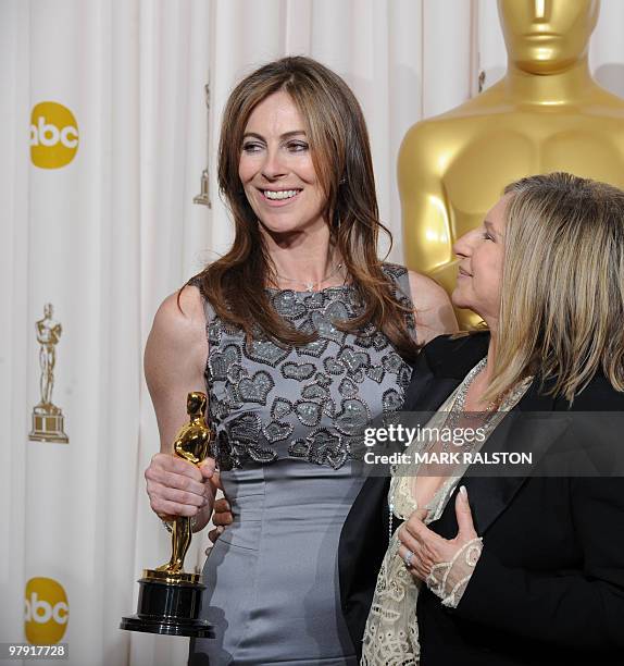 Kathryn Bigelow celebrates winning the best director Oscar with actress Barbra Streisand during the 82nd Academy Awards at the Kodak Theater in...