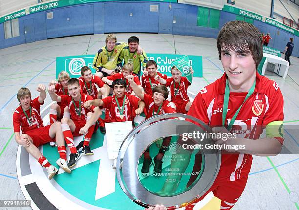 Players of 1st placed FC Energie Cottbus celebrating after winning the DFB c-junior futsal cup at the Sporthalle "Am Friedrichsberg" on March 21,...