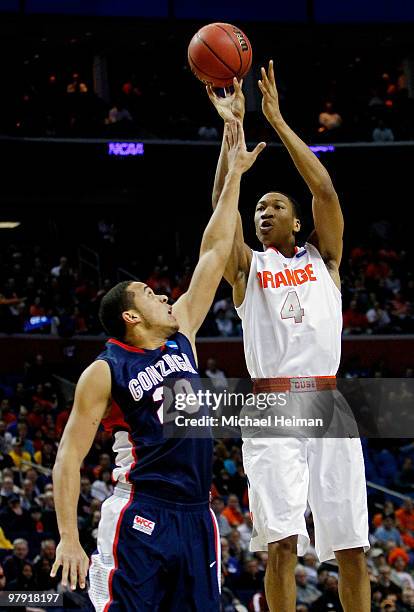 Wes Johnson of the Syracuse Orange shoots the ball against Elias Harris of the Gonzaga Bulldogs during the second round of the 2010 NCAA men's...