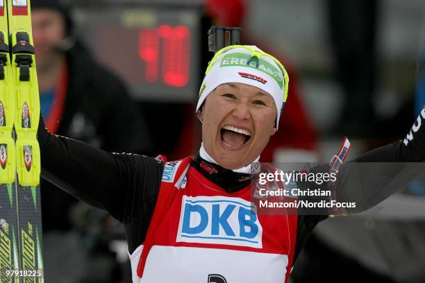 Simone Hauswald of Germany celebrates her third victory in a row with the women's mass start in the E.On Ruhrgas IBU Biathlon World Cup on March 21,...