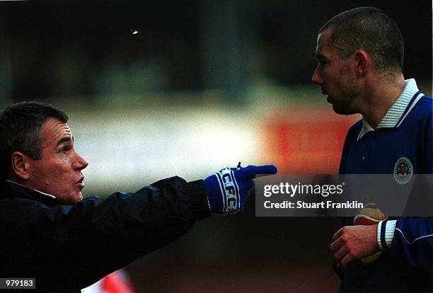 Leicester manager Peter Taylor gives his orders to Muzzy Izzet during the match between Leicester City v Arsenal in the FA Carling Premiership at...