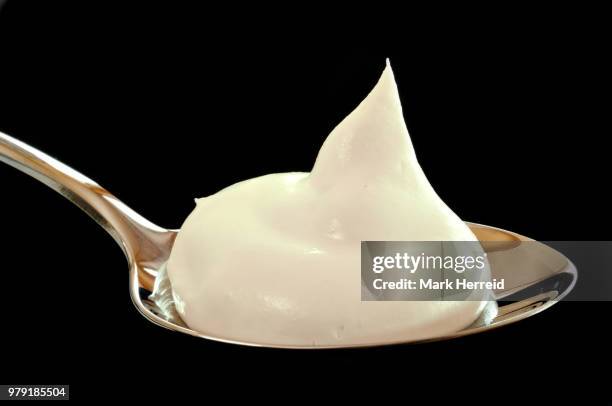 whipped cream on a spoon - creme fraiche stock pictures, royalty-free photos & images