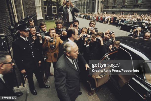 British Labour Party politician and Prime Minister of the United Kingdom, Harold Wilson pictured leaving 10 Downing Street in London to meet with the...