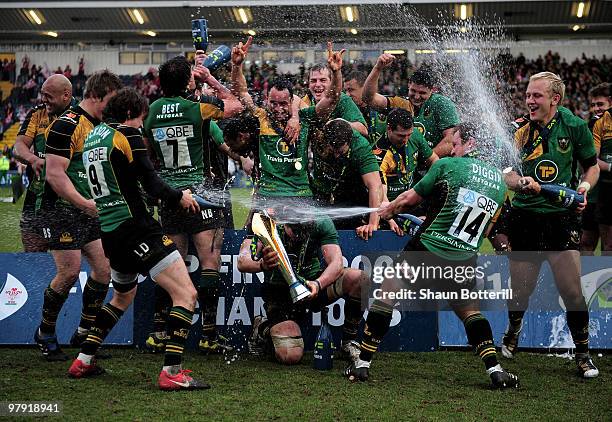 Phil Dowson the Northampton captain celebrates with team-mates at the end of the LV Anglo Welsh Cup Final between Gloucester and Northampton Saints...