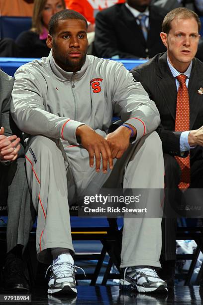 Arinze Onuaku of the Syracuse Orange looks on from the bench against the Gonzaga Bulldogs during the second round of the 2010 NCAA men's basketball...