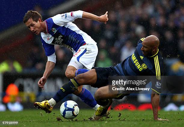 Nicolas Anelka of Chelsea challenges Morten Gamst Pedersen of Blackburn Rovers during the Barclays Premier League match between Blackburn Rovers and...