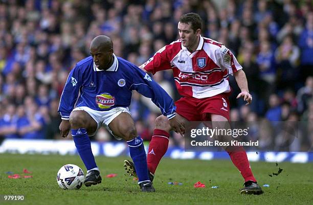 Dean Sturridge of Leicester holds off Paul McCarthy of Wycome during the match between Leicester City and Wycombe Wanderers in the AXA FA Cup Sixth...