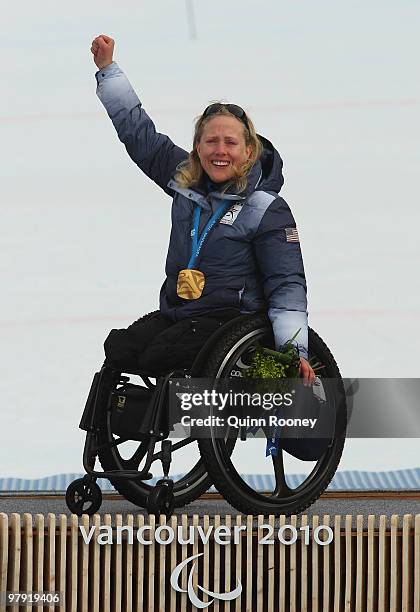 Gold medalist Stephani Victor of USA celebrates at the medal ceremony for the Women's Sitting Super Combined during Day 9 of the 2010 Vancouver...