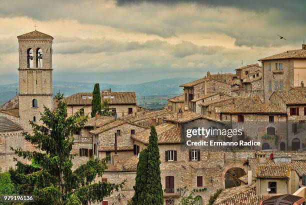 townscape with traditional architecture, assisi, perugia, italy - radice stock pictures, royalty-free photos & images