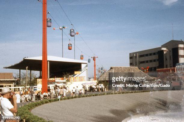 View outside the International Fountain at the Century 21 Exposition Seattle World's Fair, in Seattle, Washington, July, 1962. At center frame is the...