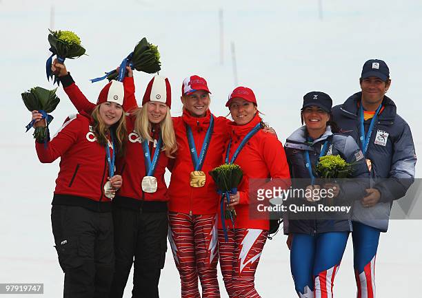 Silver medalist Viviane Forest of Canada and guide Lindsay Debou, gold medalist Henrieta Farkasova of Slovakia and guide Natalia Subrtova and bronze...