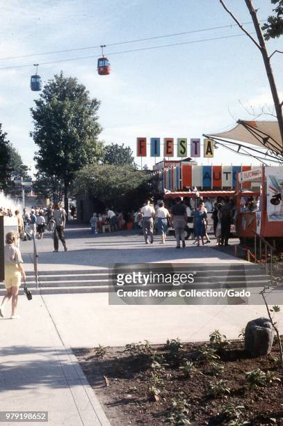 View of the Fiesta Restaurant building located next to the International Fountain at the Century 21 Exposition Seattle World's Fair, in Seattle,...