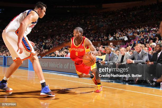Aaron Brooks of the Houston Rockets in action against Danilo Gallinari of the New York Knicks on March 21, 2010 at Madison Square Garden in New York...
