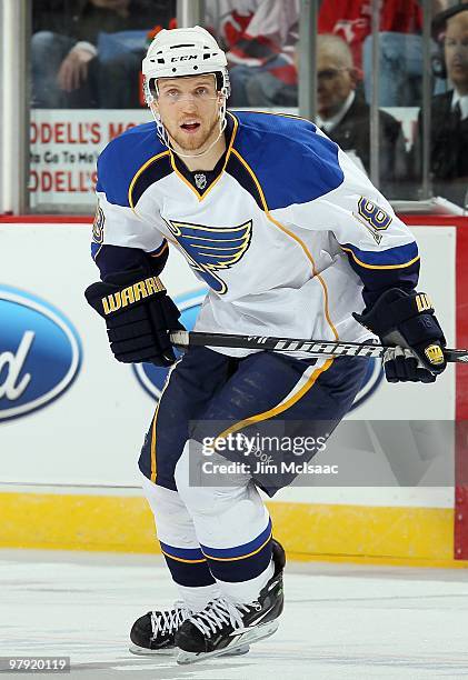 Jay McClement of the St. Louis Blues skates against the New Jersey Devils at the Prudential Center on March 20, 2010 in Newark, New Jersey. The Blues...