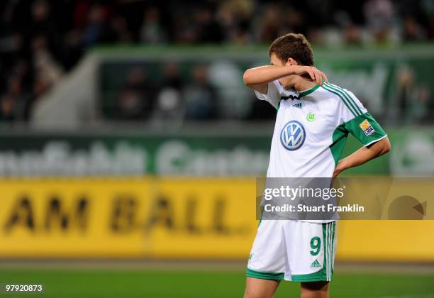 Edin Dzeko of Wolfsburg looks dejected during the Bundesliga match between VfL Wolfsburg and Hertha BSC Berlin at Volkswagen Arena on March 21, 2010...