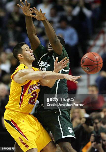 Greivis Vasquez of the Maryland Terrapins is defended by Draymond Green of the Michigan State Spartans during the second round of the 2010 NCAA men's...