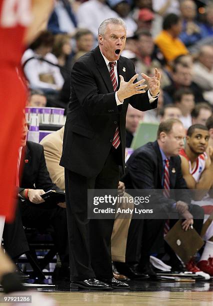 Bo Ryan head coach of the Wisconsin Badgers yells out to his team while facing the Cornell Big Red during the second round of the 2010 NCAA men's...