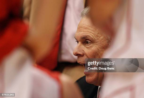 Head coach Bo Ryan of the Wisconsin Badgers talks with his team during a timeout while facing the Cornell Big Red during the second round of the 2010...