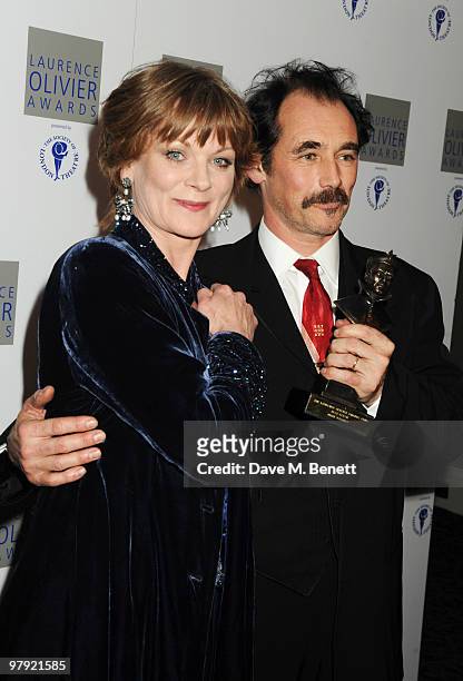 Samantha Bond and Mark Rylance pose with his Best Actor Award during The Laurence Olivier Awards, at the Grosvenor House Hotel on March 21, 2010 in...