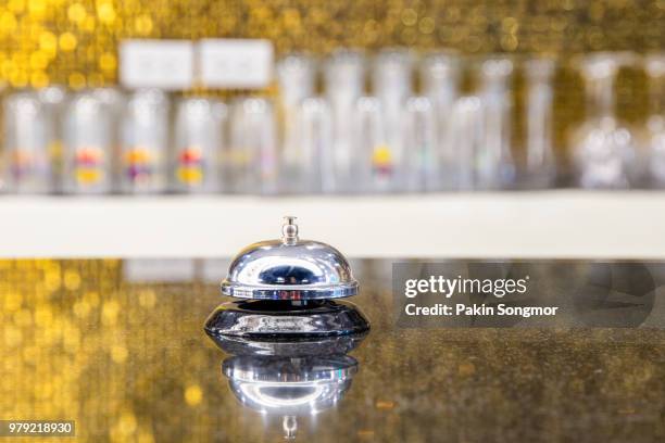 hotel restaurant bell service on concierge customer reception counter - quick service restaurant stock pictures, royalty-free photos & images