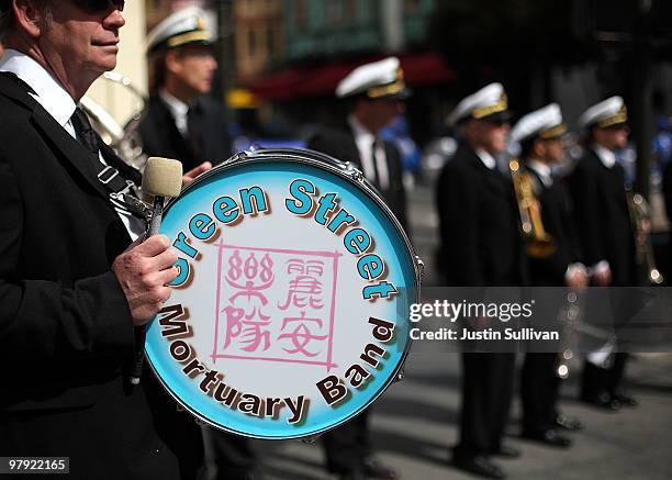 The Green Street Mortuary Band prepares to perform during a funeral procession March 21, 2010 in the Chinatown district of San Francisco, California....