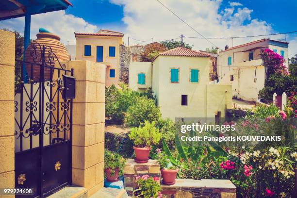 colorful flowers in old town, kythira, greece - kithira stock pictures, royalty-free photos & images