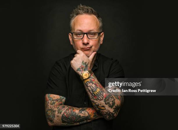 man with tattoos on black background - tattoo arm stockfoto's en -beelden