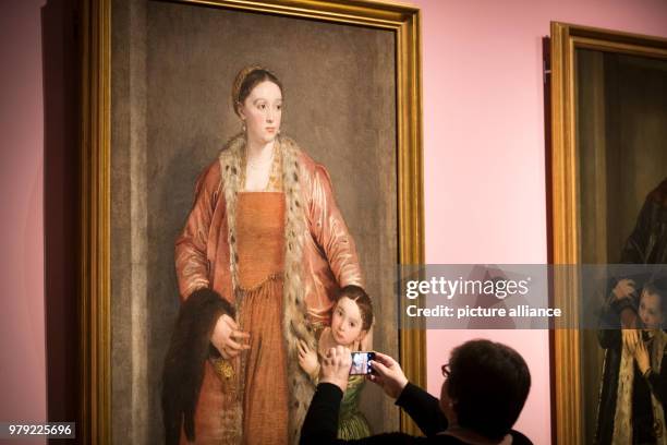 March 2018, Netherlands, Amsterdam: A visitor to the Rijksmuseum walking through the exhibition "High Society", which opens on 08 March 2018, and...