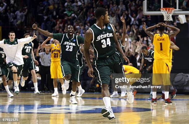 Korie Lucious of the Michigan State Spartans runs down the court after sinking a game winning three point shot at the buzzer to win 85-83 against the...