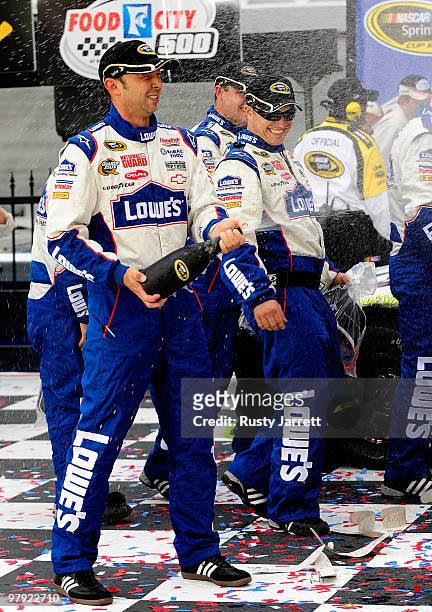 Chad Knaus , crew chief of the Lowe's Chevrolet, celebrates in Victory Lane after winning the NASCAR Sprint Cup Series Food City 500 at Bristol Motor...